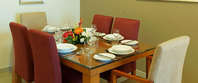 Chelsea Tower Suites & Apartments - Dining Table