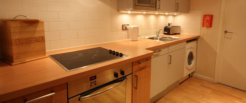 The Place Apartment Hotel - Kitchen The Place Apartment Hotel - Kitchen