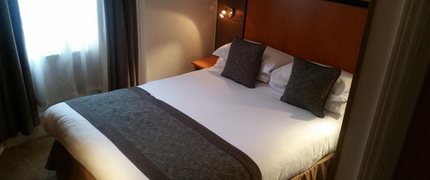 Corona Hotel Bedroom