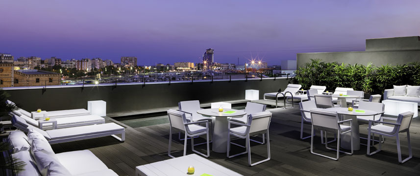 H10 Port Vell - Terrace at dusk