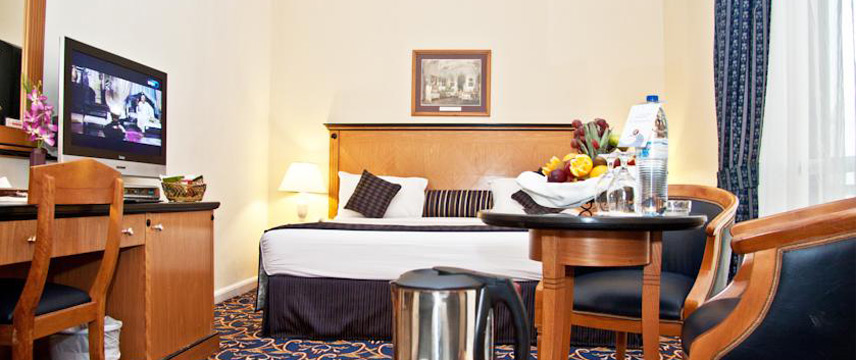 Regal Plaza Hotel - Bedroom
