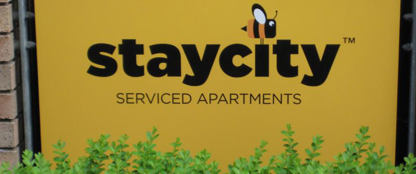 StayManchester Laystall Apartments - Sign