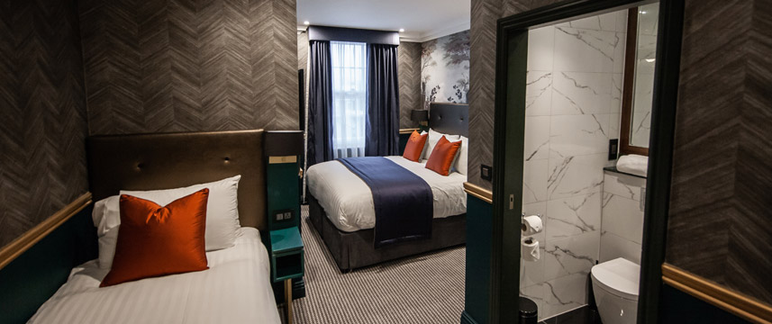 The Portico Hotel Deluxe Triple Room